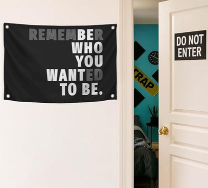 3x5 Feet Black Quoted Polyester Flag Remember Who You Wanted To Be with Four Brass Grommets - Be Who You Want To Be Quote Wall Banner - Black Posters for Man Cave - Motivational Wall Art for Bedroom