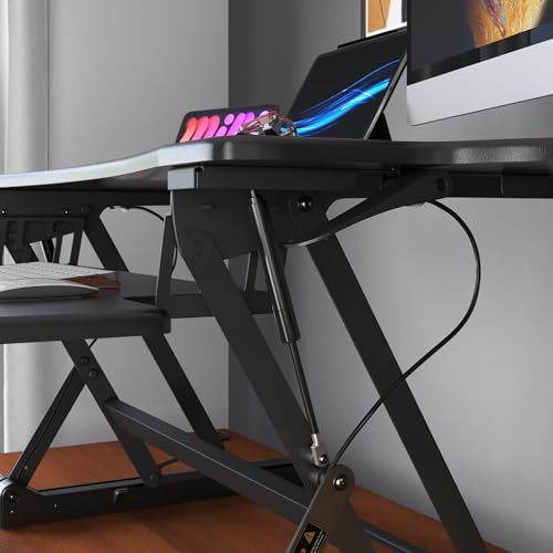 Mount-It! Standing Desk Converter, 48" Wide Sit Stand Desk Riser with Dual Gas Spring Handles, Height Adjustable from 6"–19.25", Extra Large Tabletop for 2 Monitors, Keyboard Tray & Device Slot, Black