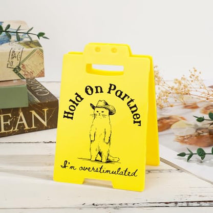 Funny Cowboy Cat Meme Desk Sign "Hold On Partner I'm Overstimulated" - Hilarious Office Decor, Sarcastic Gag Gifts for Coworkers, Introverts, Women, Men - Funny Cubicle Accessories - style: Cowboy Cat