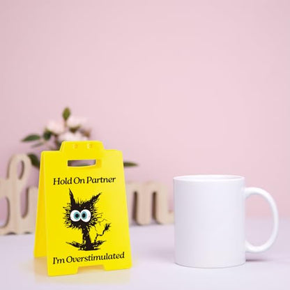 Funny Overstimulated Cat Desk Sign - Humorous Office Decor for Coworkers, Novelty Gag Gift for Mental Health and ADHD Anxiety, Social Battery Warning Sign for Cubicle and Home Office - style: Overstimulated Black Cat