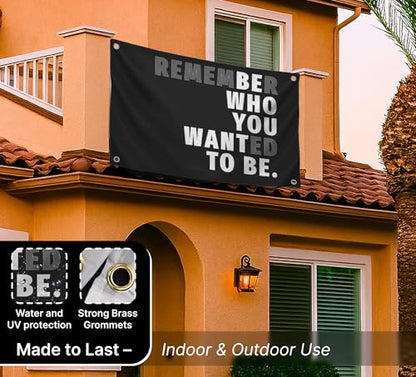 3x5 Feet Black Quoted Polyester Flag Remember Who You Wanted To Be with Four Brass Grommets - Be Who You Want To Be Quote Wall Banner - Black Posters for Man Cave - Motivational Wall Art for Bedroom