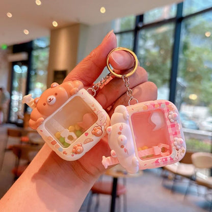 Aoekaff Mini Claw Machine Keychain Funny Tiny Arcade Games finger Toys Gifts for Bag Backpack Charm - color: Brown Bear